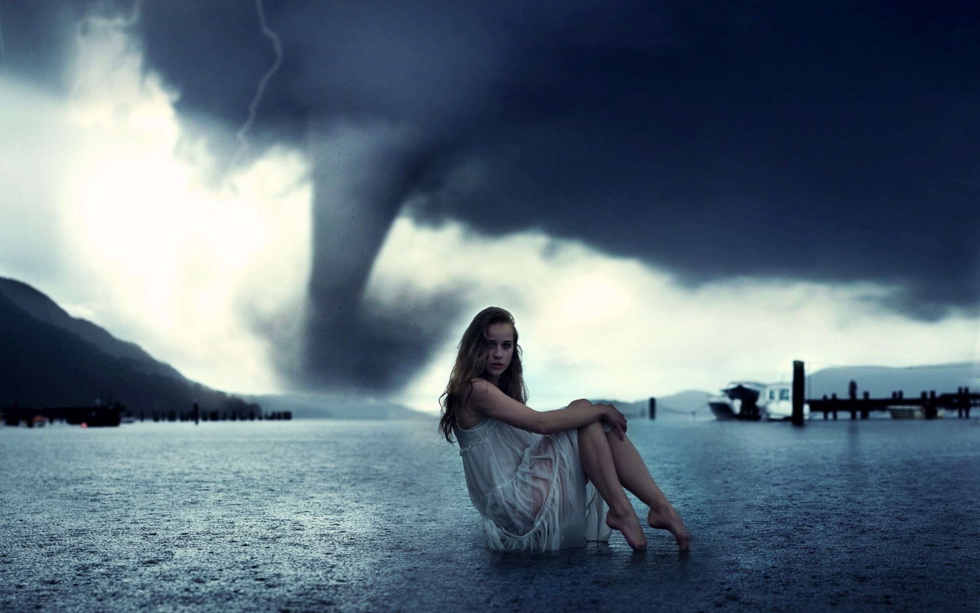 http://on-desktop.com/wps/Girls_Girl_posing_against_the_backdrop_of_a_tornado_102989_.jpg