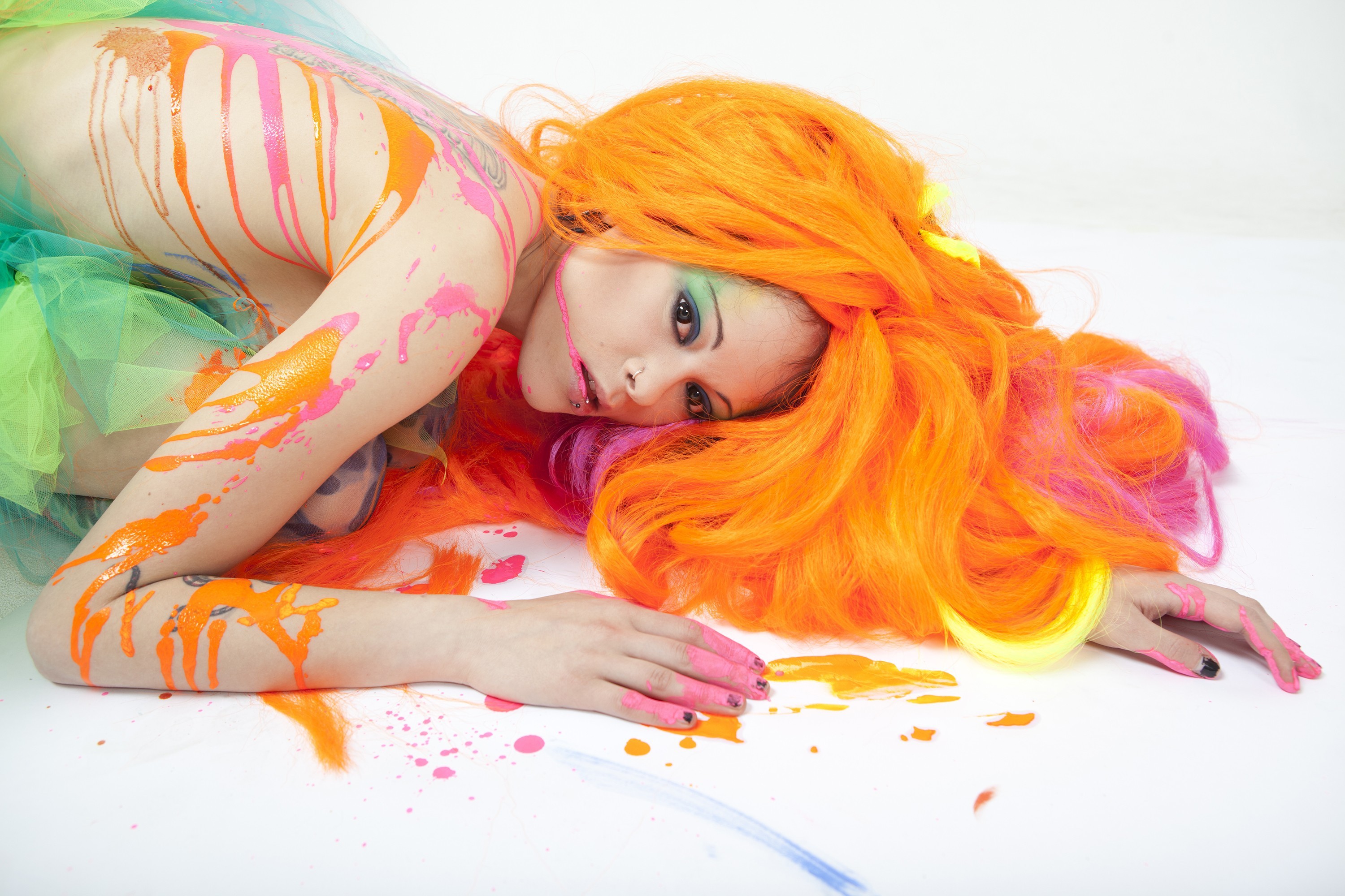 http://on-desktop.com/wps/Girls_She_paints_with_orange_hair_105720_.jpg